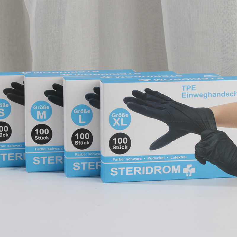 Bonne résistance à la température Gants TPE noirs (motif de points)