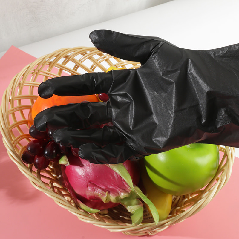 Bonne résistance à la température Gants TPE noirs (motif de points)