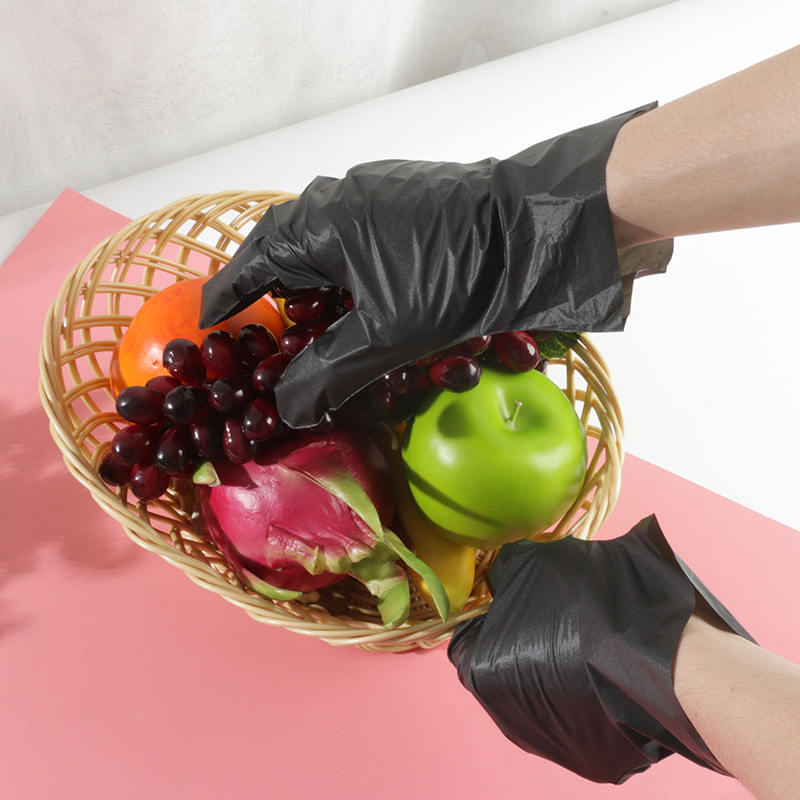 Bonne résistance à la température Gants TPE noirs (motif de points)