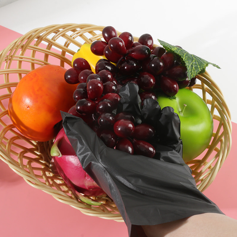 Bonne résistance à la température Gants TPE noirs (motif de points)