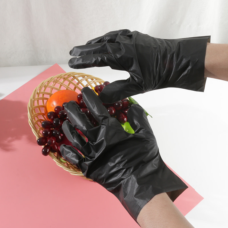 Bonne résistance à la température Gants TPE noirs (motif de points)