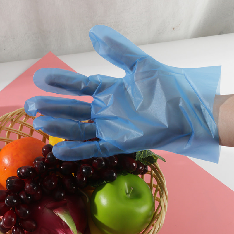 Résistance chimique Gants TPE bleus (motif de points)