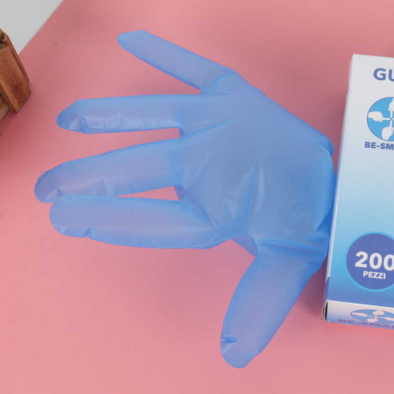 Résistance chimique Gants TPE bleus (motif de points)