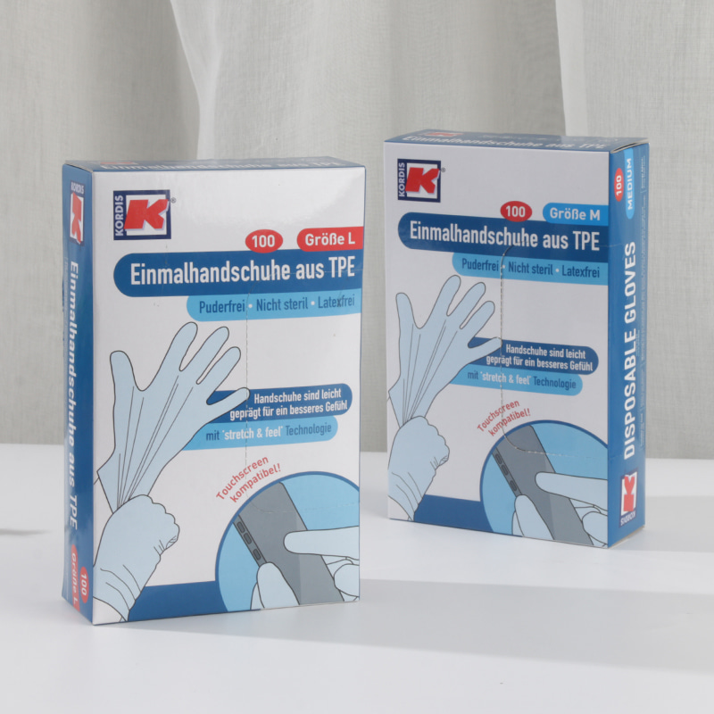 Gants en TPE (Élastomère Thermoplastique) crème pâle, souples et respectueux de l'environnement (motif en points)